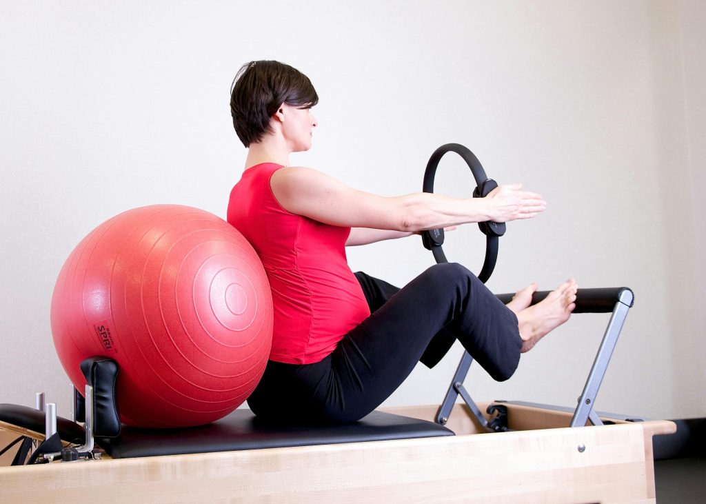 Pregnant women working out